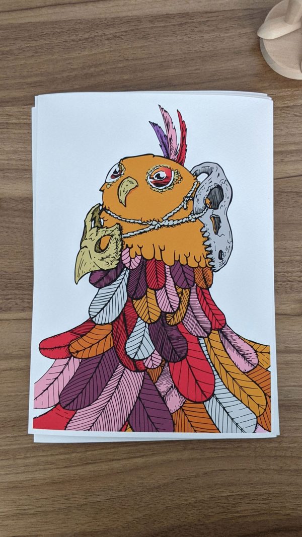 Owl Feathers. An owl has a bird mask and a dinosaur skull strapped to it, with a huge assortment of feathers flowing underside. Autumn colours of reds, oranges, purples and maroons.
